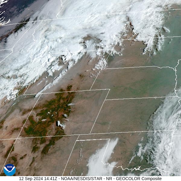 Thursday morning’s satellite shows an area of low pressure marching across the Northern Rockies. 